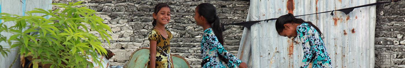 Random click of three native girls chatting