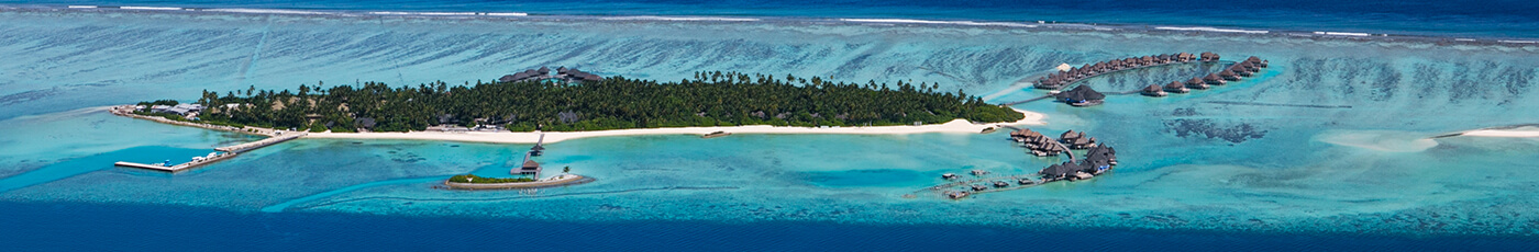 Arial views of Maldives Islands with overwater beach villas