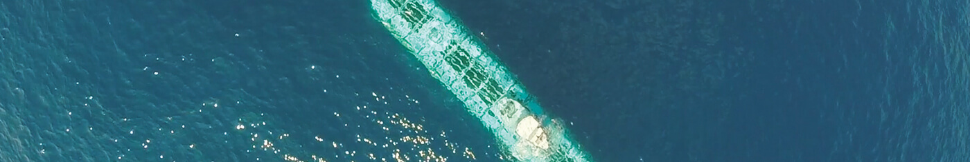 Submarine cruising in free water in Maldives sea