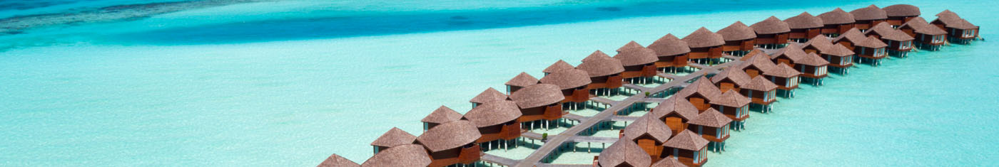 Arial view of the overwater villas in Maldives sea for a exclusive vacation