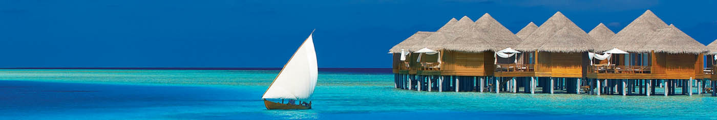 Sights of the overwater villas with cone shaped roofing in Maldives