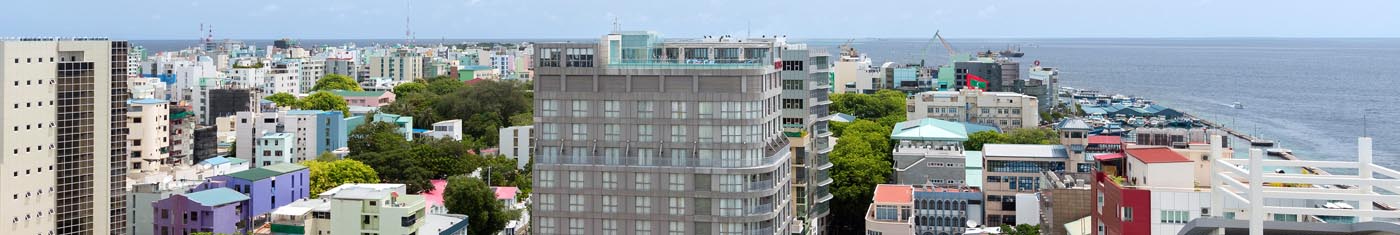 Arial view of the skyscrapers in Maldives islands encircled by the ocean