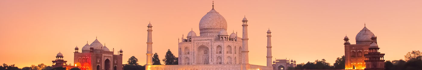 View of the Taj Mahal with two identical buildings beside it