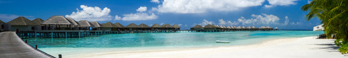 Scenic views of the overwater villas in the shallow water in Maldives