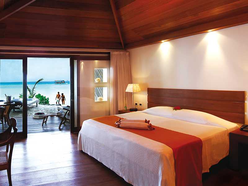Beach bungalows in Maldives with wooden flooring