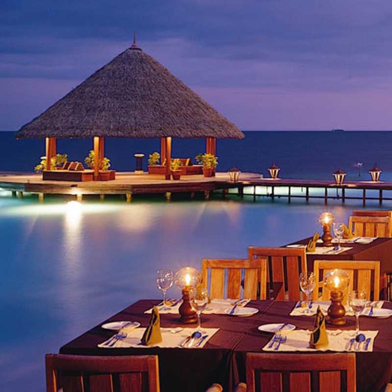 Distance view of the over water dining area at Rivali Maldives