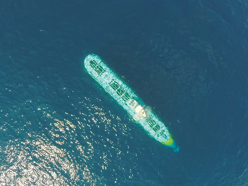 Birdseye view of the submarine diving in the Maldives water