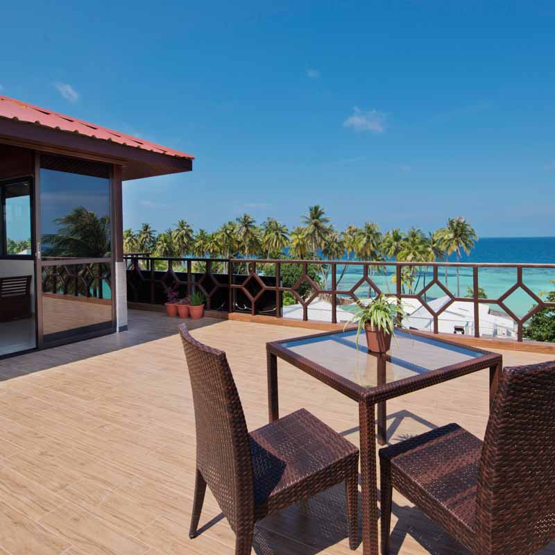 Hotel balcony area with scenic views of the beach in Maldives